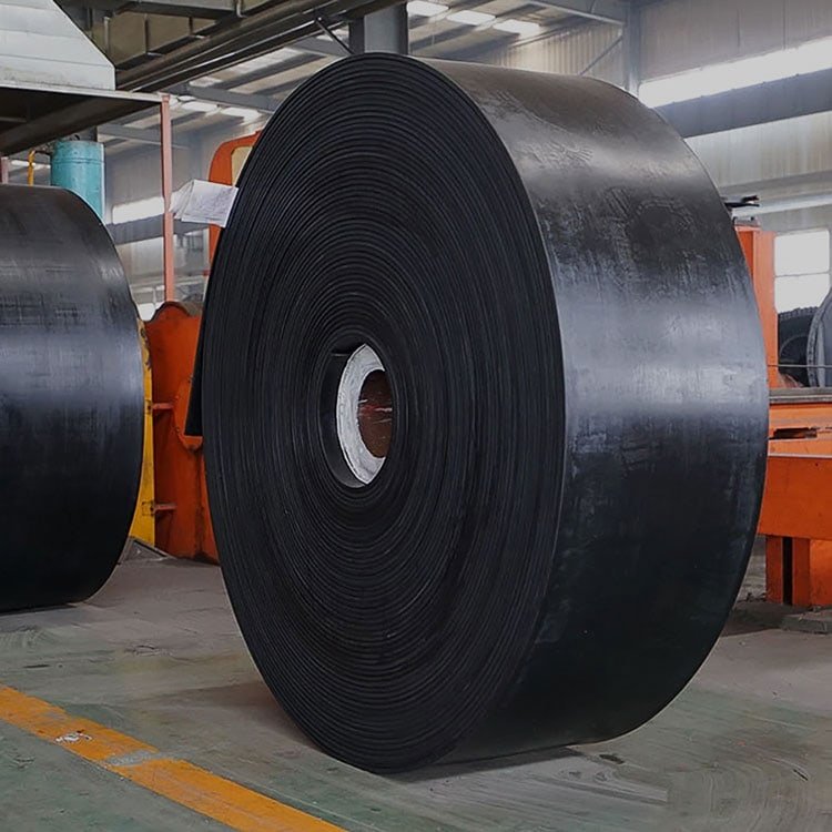 rubber conveyor belts rolled in conveyor belt in conveyor belt warehouse.